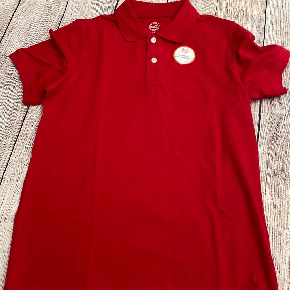 Boys school uniform polo size large 10/12 new with tags.